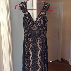 Nude and black dress